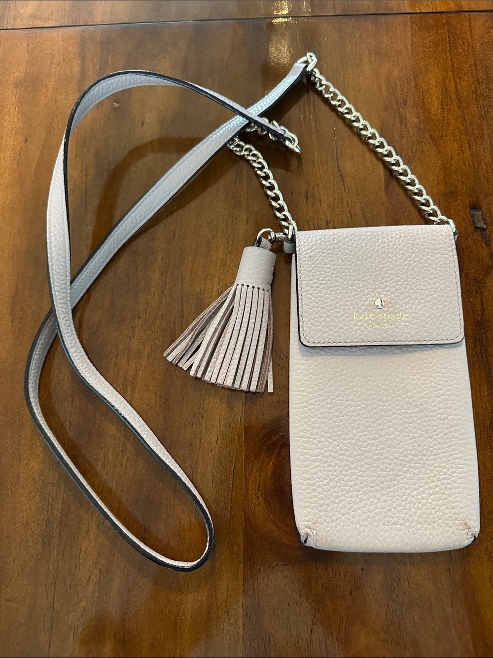 kate spade Pebbled Leather Crossbody Phone Bag in Light Blush with Tassel